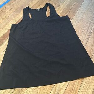 Ann Taylor black silk pocket long racer back tank. Size 6.